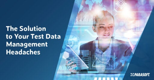 The Solution to Your Test Data Management Headaches and image of woman touching a large touch screen with multiple charts and graphs