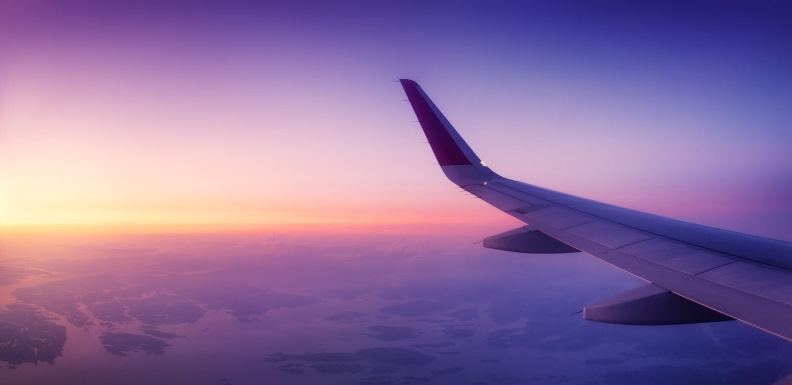 Aircraft wind on the sunrise sky background. Composition of aircraft. Air transport. Travel by airplane. Travel - image