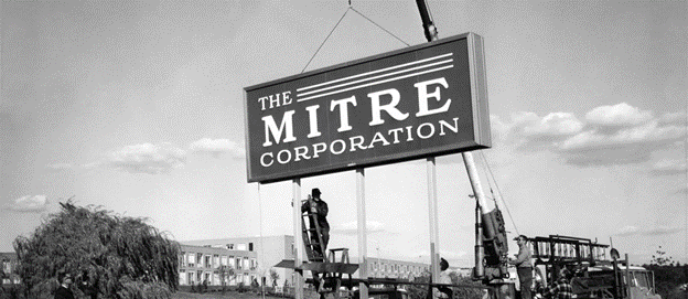 Image of the Mitre corporation logo in black and white photo