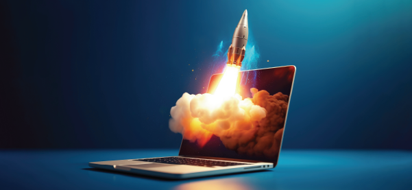 Graphic of rocket launching out of computer